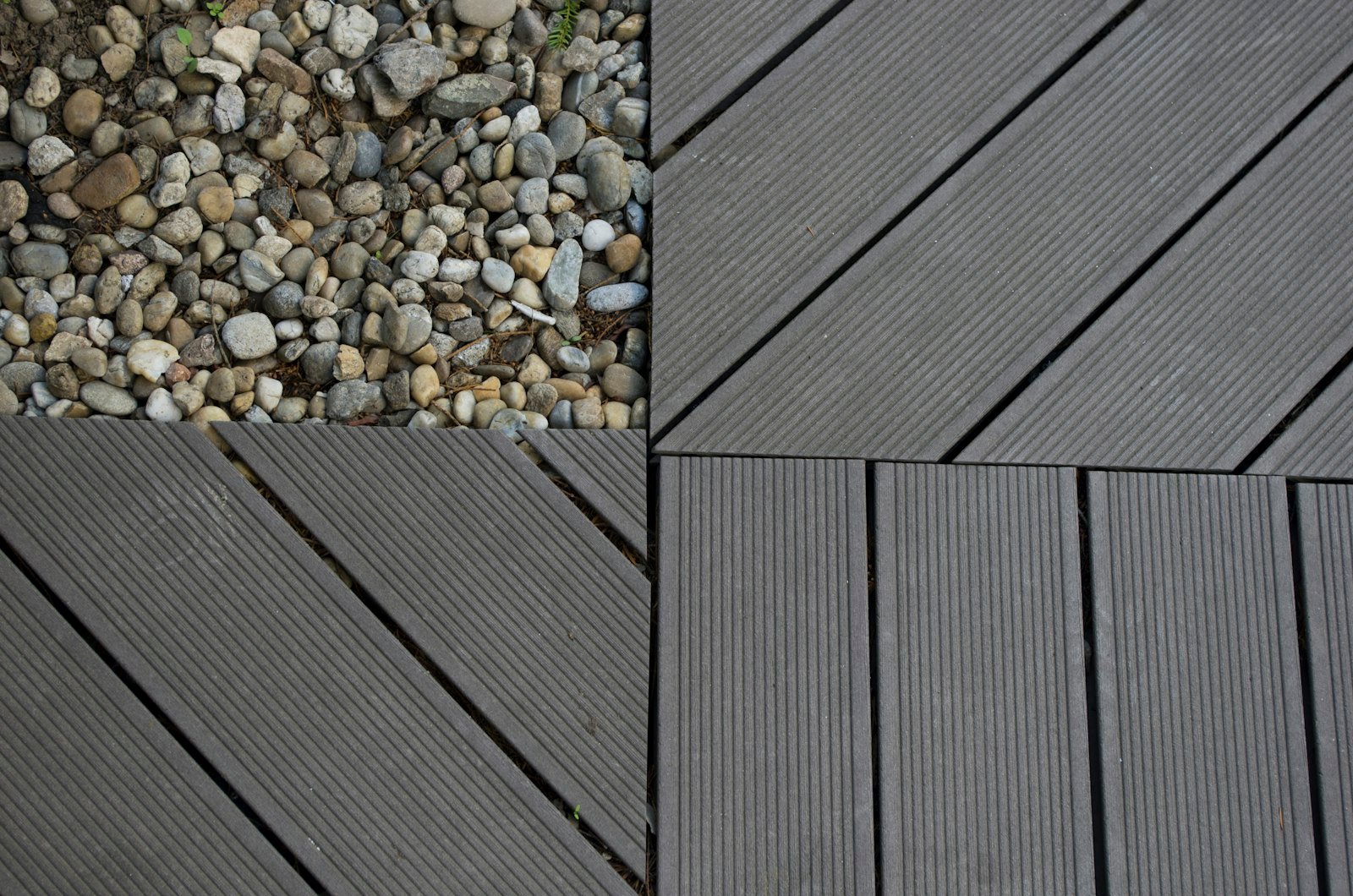 Composite deck boards on a finished deck by KP Landscaping in Buffalo NY