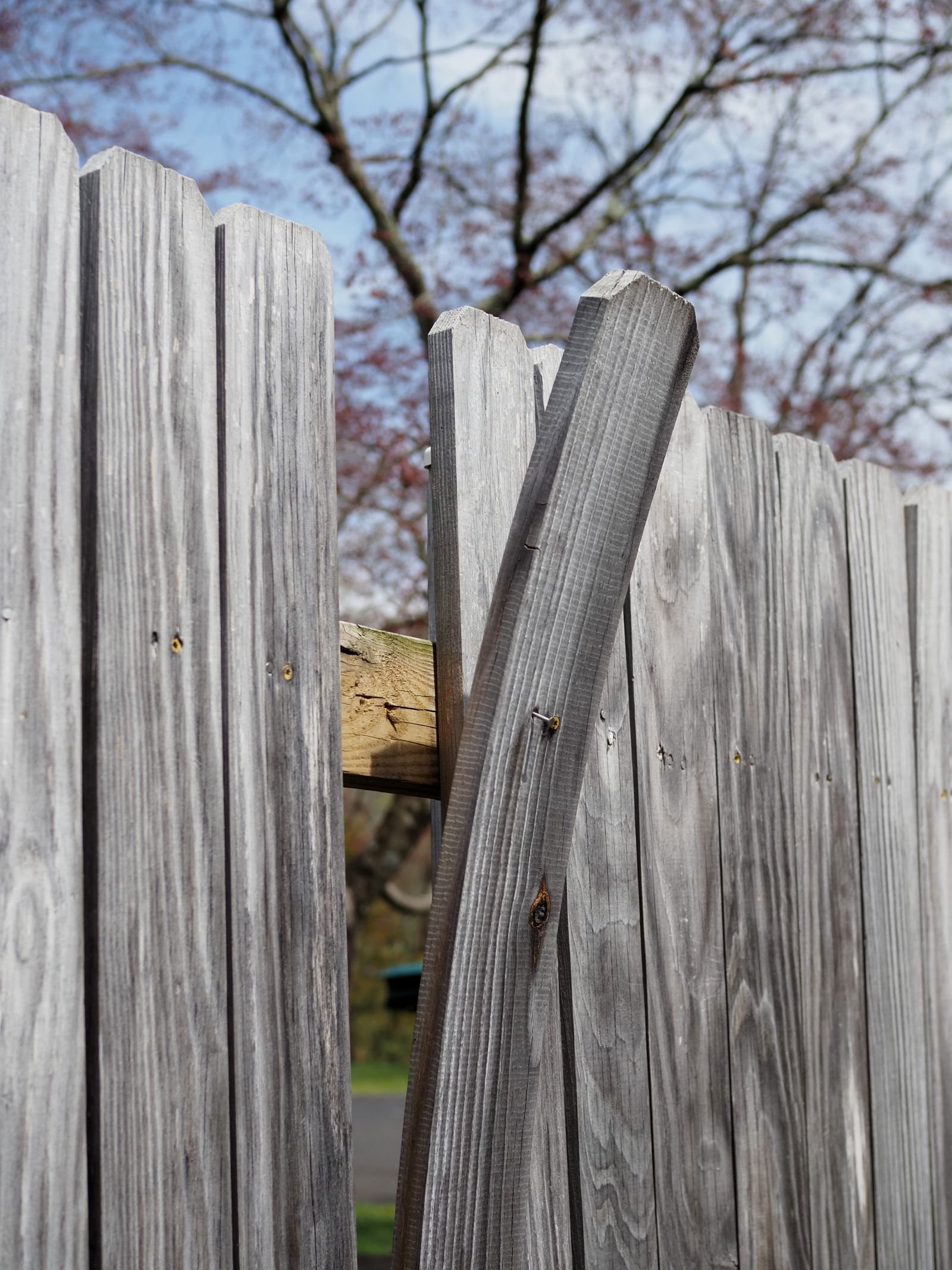 Fence repair replacing damaged pickets by KP Landscaping in Buffalo NY
