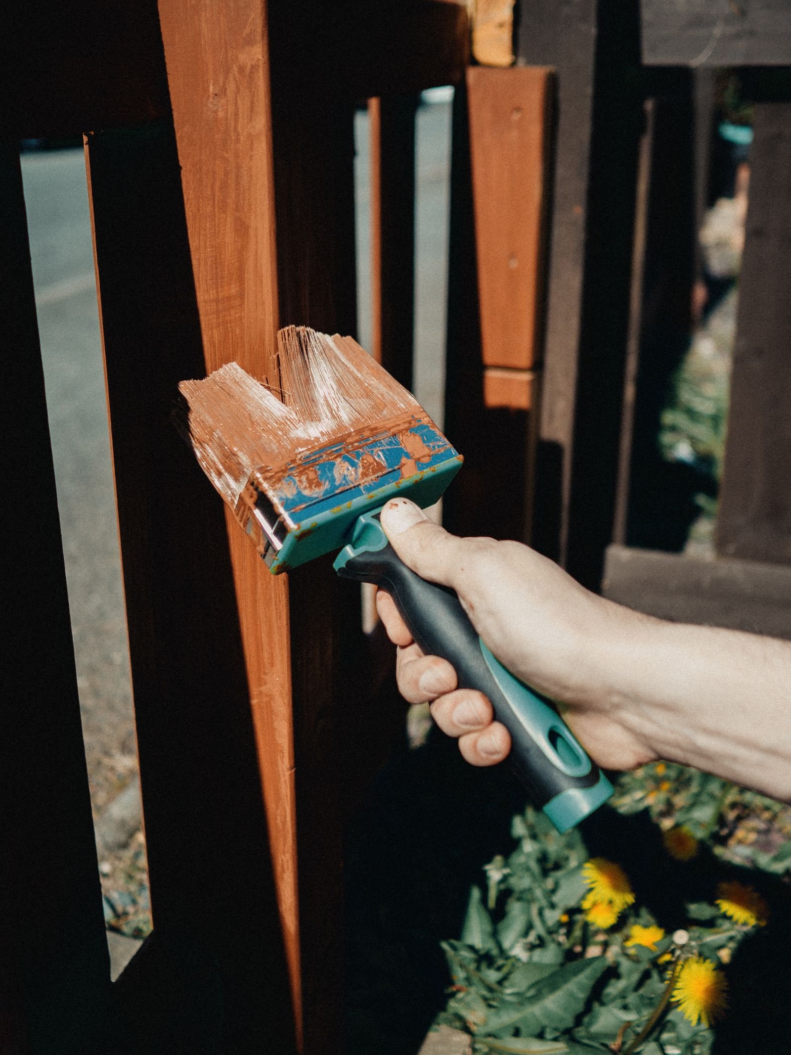 Staining and sealing a wood fence by KP Landscaping in Buffalo NY